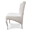 Białe krzesło skośne Ludwik pikowane w karo kryształkami
