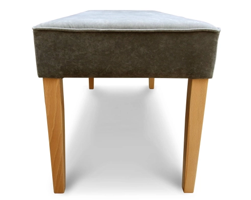 Pufa wąska z siedziskiem gładkim, niepikowanym z lamówką na obrzeżach