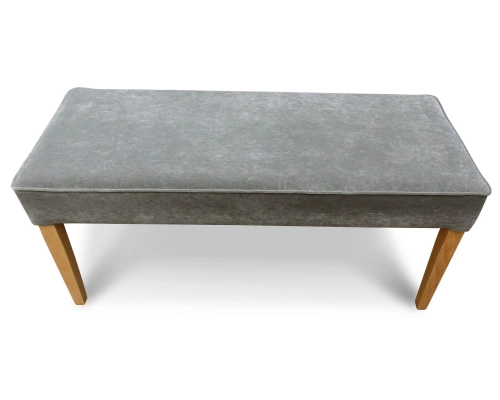 Pufa wąska z siedziskiem gładkim, niepikowanym z lamówką na obrzeżach